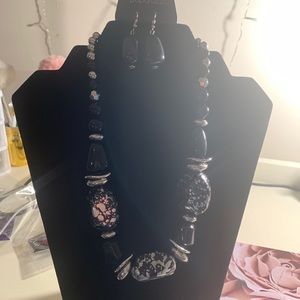 A black and sliver spotted necklace
